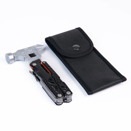 Black multifunctional wrench hammer tool with pliers and saw on white background