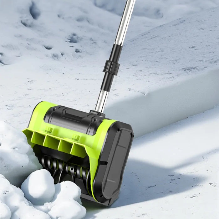 Taskrafter electric snow shovel clearing a deep path in white snow.