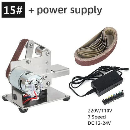 Mini belt sander kit with a 7-speed power adapter and replacement sanding belts.