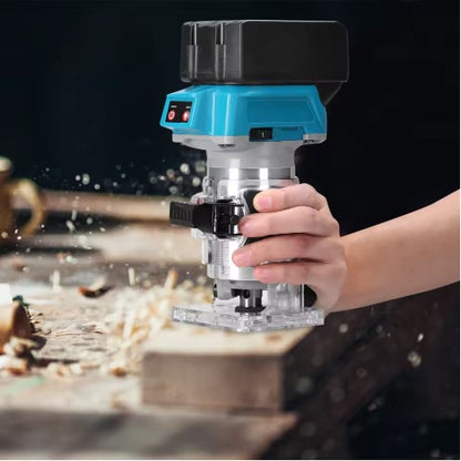 Close-up of a cordless wood router cutting a wooden plank with flying chips.