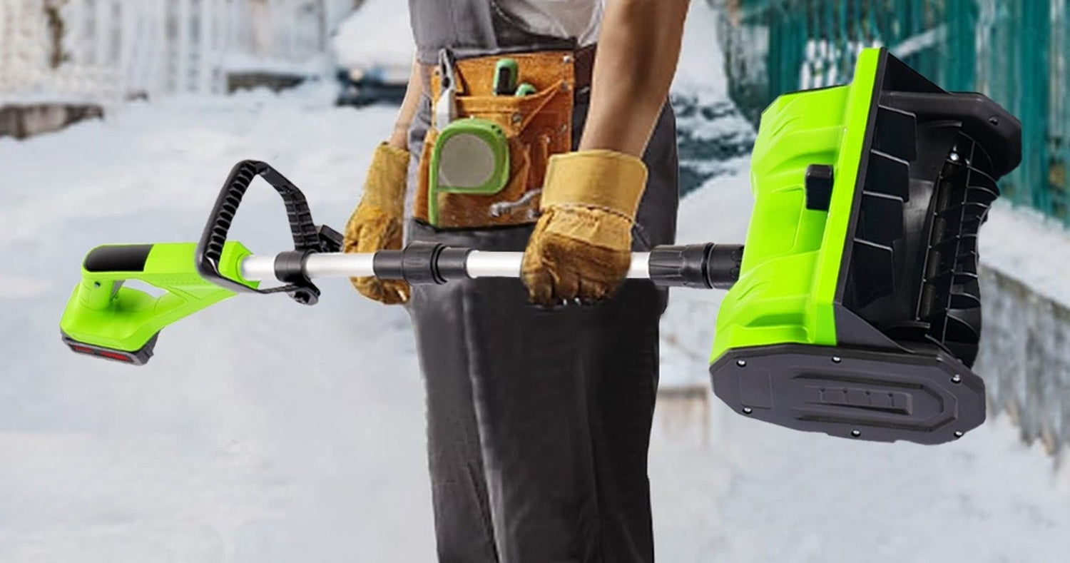 Lightweight electric snow shovel carried by a person in winter gear.