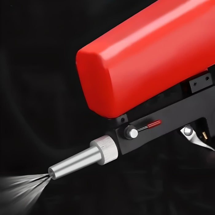 Close-up of a high-pressure sandblasting gun showing the 90 PSI pressure gauge