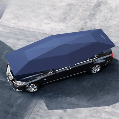 Top view of a blue folding car umbrella providing full shade for a black sedan