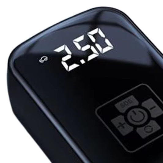 Close-up of a digital tire inflator screen showing pressure and control buttons.