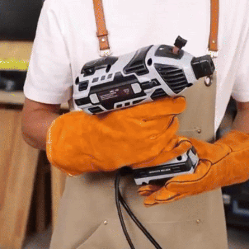 High-velocity cooling fan on the back of a portable handheld arc welder